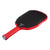 White background, product image of the Agassi x JOOLA Pro Pickleball paddle, red handle, black surface.