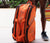 Close up product image of a JOOLA Elite Pro Pickleball Bag, orange.