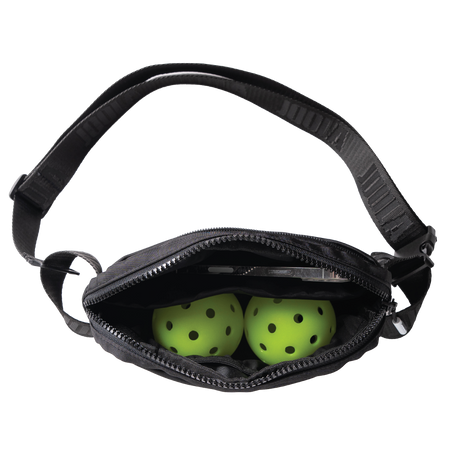 Aerial view of two-pickleballs inside a JOOLA belt bag.