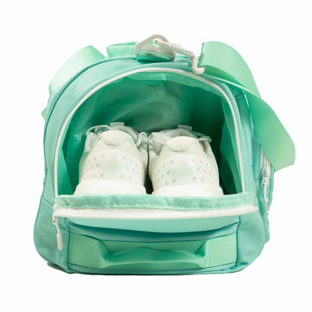 White background, image of the shoe compartment with a pair of JOOLA shoes.