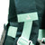 Close-up of a green backpack with JOOLA brand logo on the strap.
