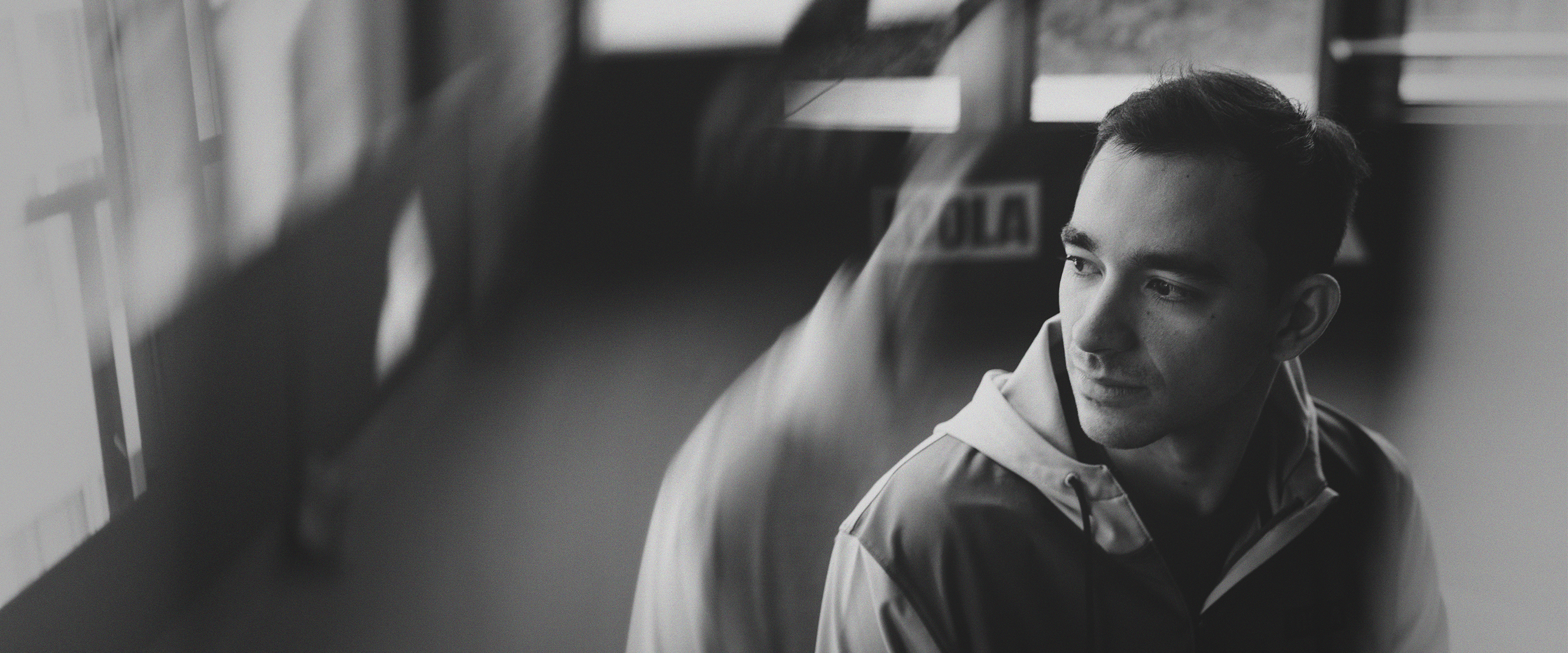 Stylized, blurred image of JOOLA Table Tennis star Hugo Calderano.