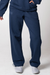 Gray background, image of a female model wearing a pair of JOOLA fleece pants, blue.