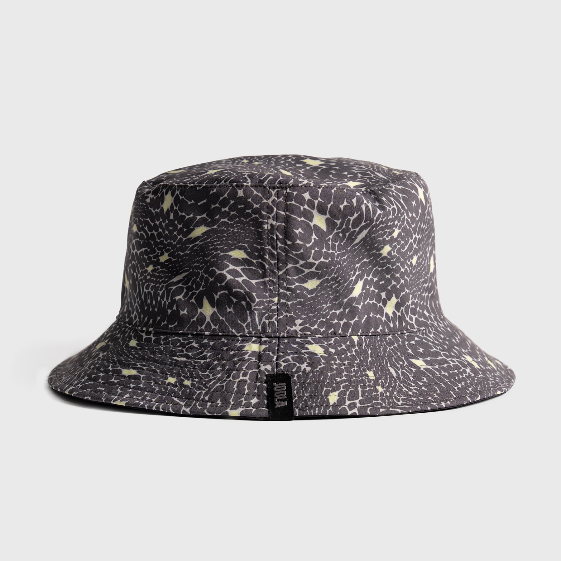 Bucket hat with serpentine pattern on a light gray background
