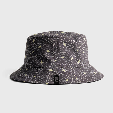 Bucket hat with serpentine pattern on a light gray background
