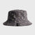 Bucket hat with serpentine pattern on a light gray background