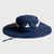 Navy blue wide-brimmed hat with white logo on a light gray background