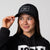 Image of a female model wearing a JOOLA Court Hat, black and white.