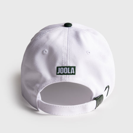White and green JOOLA Collegiate cap with pickleball club logo on a light gray background. Image shows the details on the back of the hat.