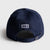 Navy blue Collegiate pickleball cap with the JOOLA Wordmark on the back.