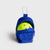 Blue JOOLA Micro bag with carabiner, open with a single pickleball inside, on a light gray background.