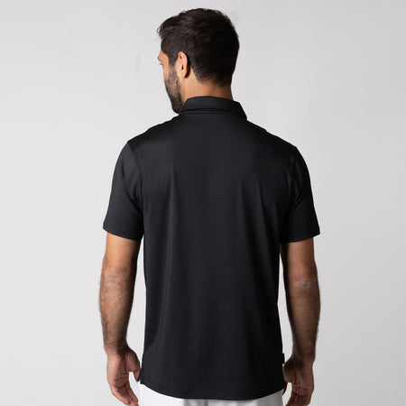 Image showing the back of a male model wearing a JOOLA Men's Club Polo, Black.