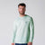 Image of a male model wearing a JOOLA Men's Court Long Sleeve Shirt, Hushed Mint.