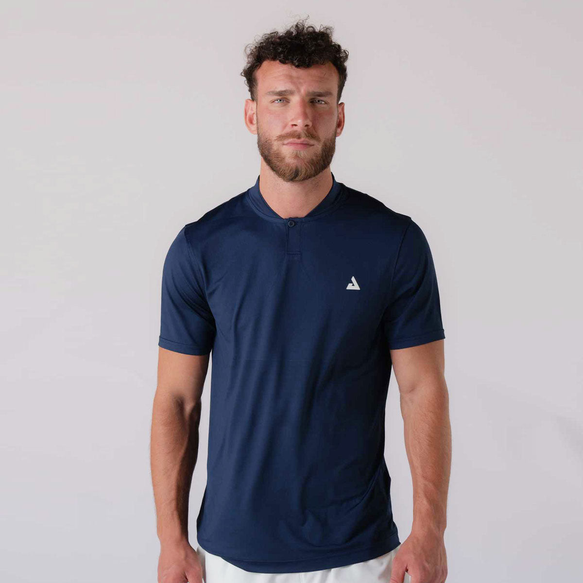 Male model wearing a JOOLA Men's Court Polo, Navy.