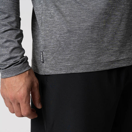 Close up image of the JOOLA Logo on the JOOLA Men's Quarter Zip, Charcoal Heather.