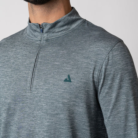 Close up image of the JOOLA Men's Quarter Zip Pullover, highlighting the JOOLA Trinity Logo  at the left chest.