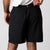 Image highlighting the branded woven pinch tab at the waistband on the Men's Woven Shorts with a seven-inch inseam.