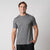 Image of a male model wearing a JOOLA Men's Club Short Sleeve Shirt, Charcoal Heather.