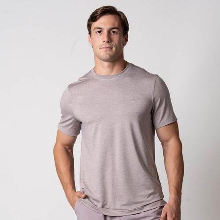 Image of a male model wearing a JOOLA Men's Club Short Sleeve Shirt, Dusty Mauve.