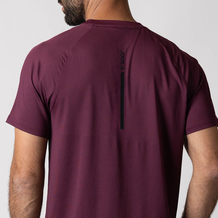 Image showing the JOOLA logo down the center back of a JOOLA men's court short sleeve shirt, Bordeaux.