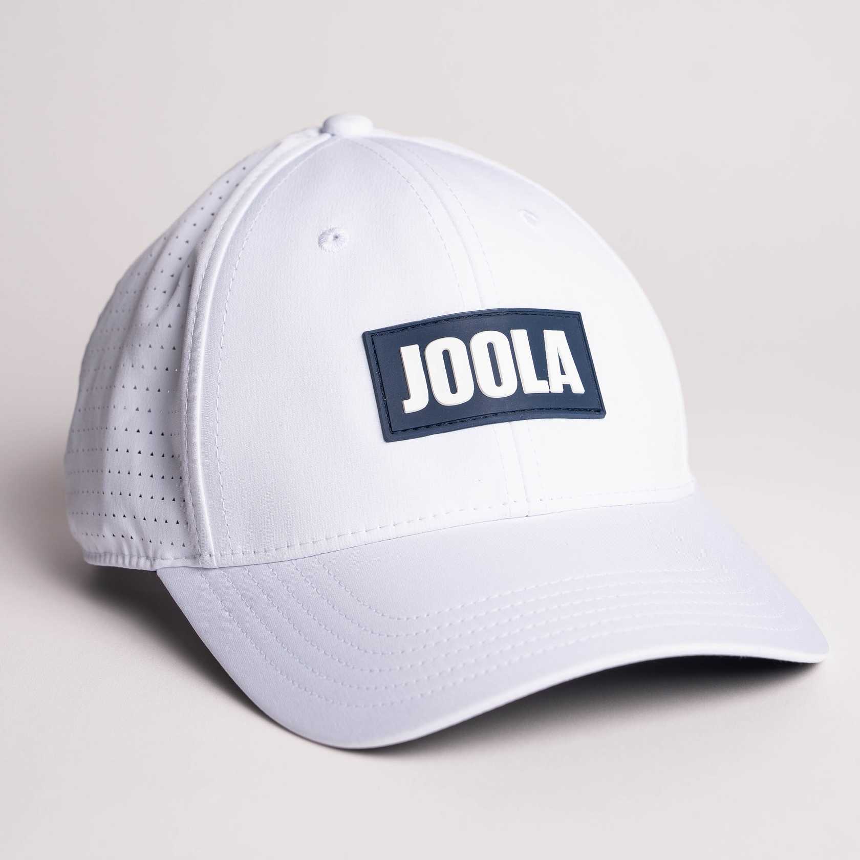 White background, product image of the JOOLA Perforated Cap, white and blue.