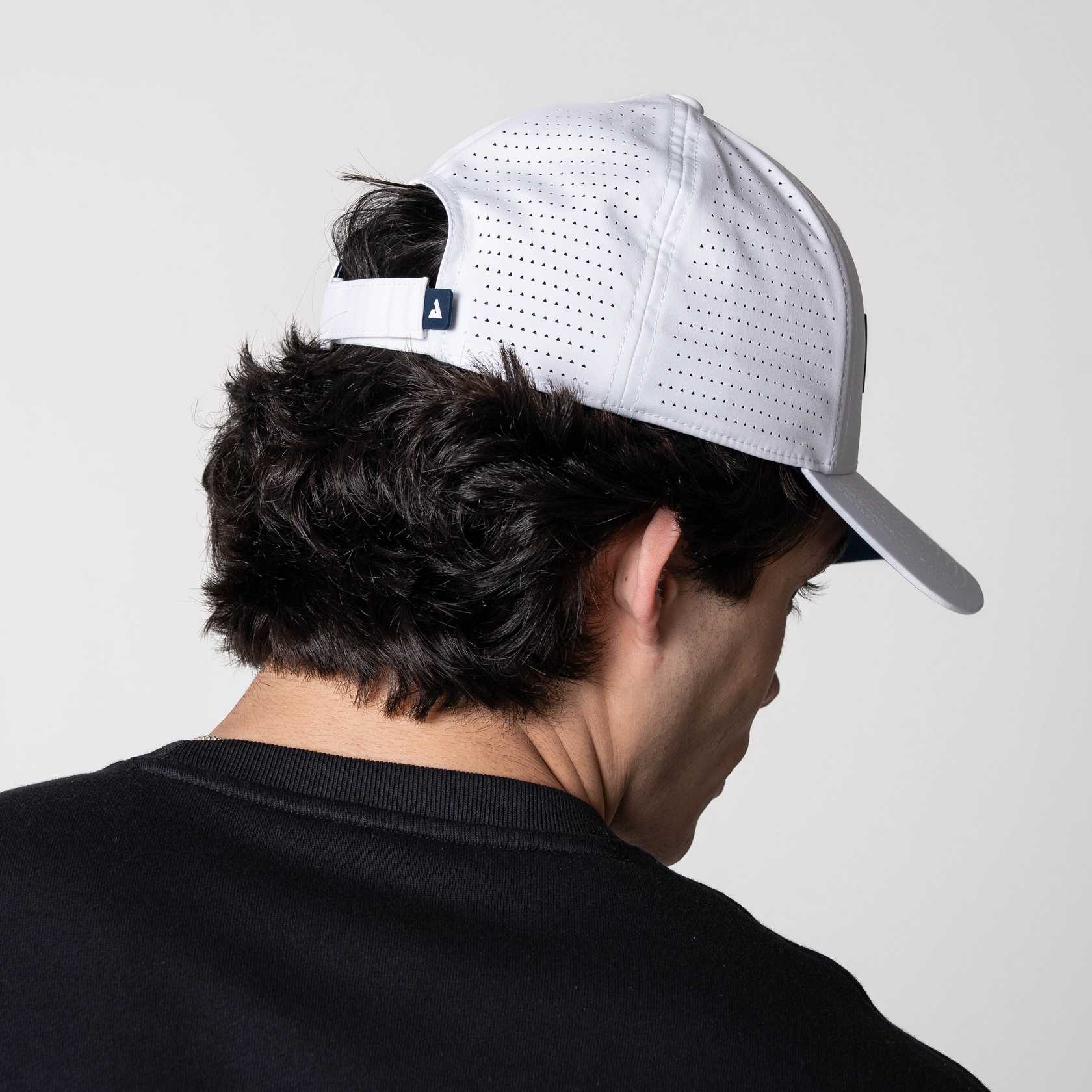 Image showing the back of a JOOLA Perforated Cap, White and Blue.