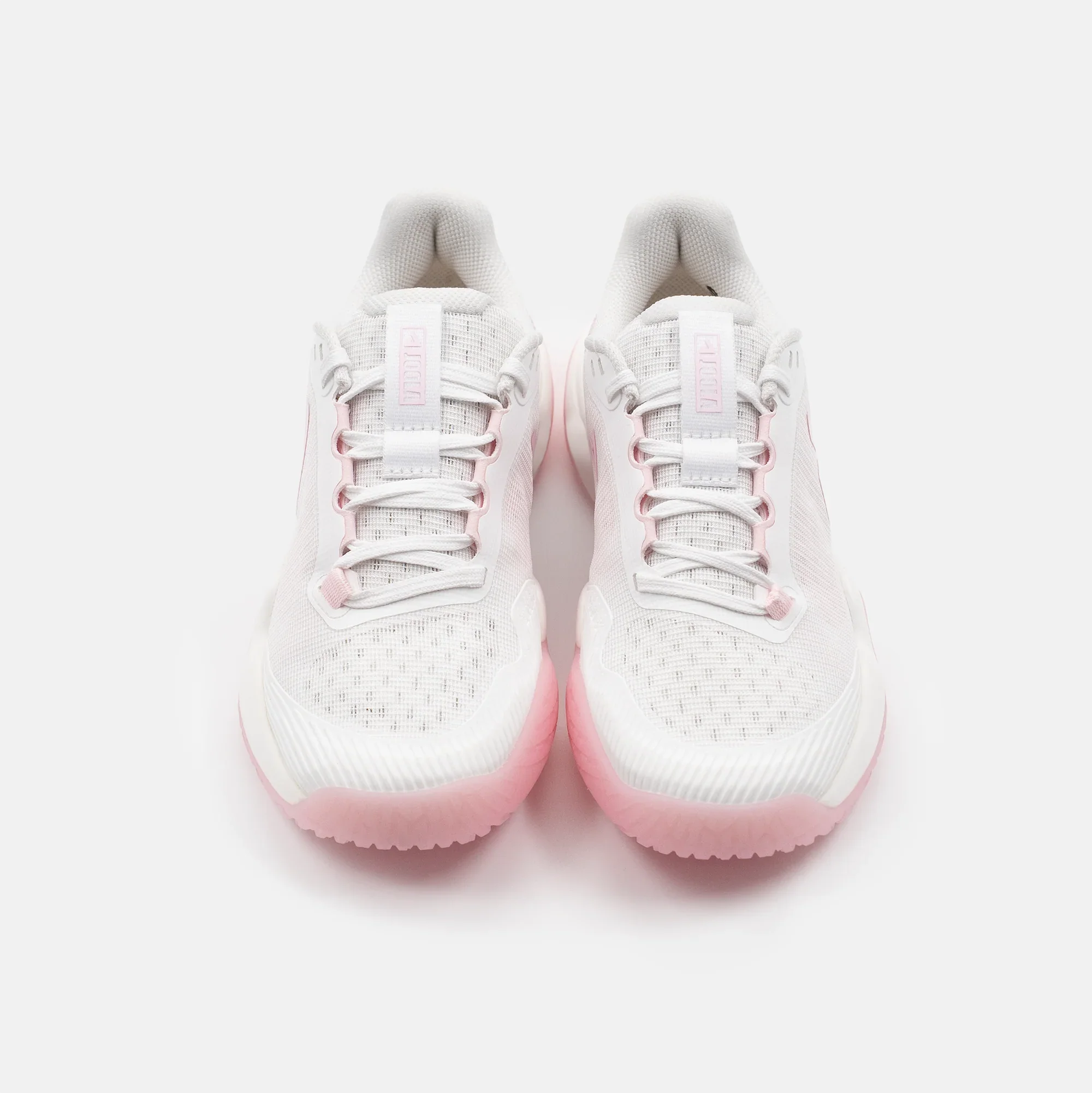 White background, aerial view of a pair of women's JOOLA R4LLy pickleball shoes, white and pink colorway.