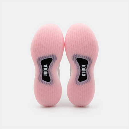 White background, image showing the pink tred and black JOOLA carbon fiber shank on the bottom of a pair of JOOLA Women's R4LLy pickleball shoes, pink and white colorway.