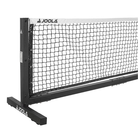 White Background Image: Closeup shot of the left half of the JOOLA Pro Pickleball Net. Net has stationary legs and the net features a side hand crank with steel cable stabilizing system.