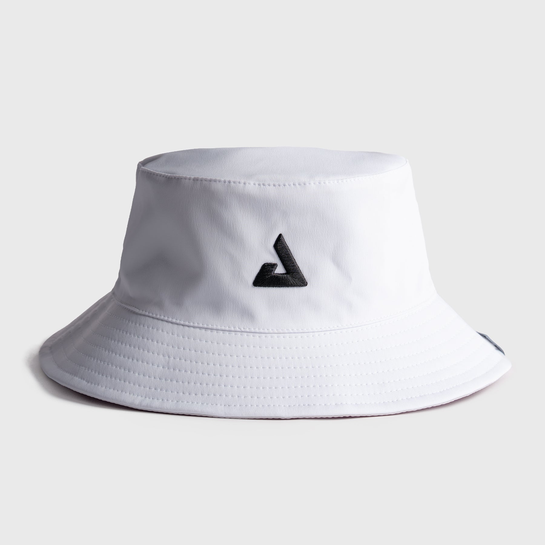 White bucket hat with a black JOOLA Trinity logo on a light gray background