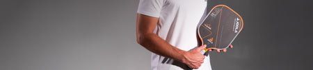 Header image of Collin Johns holding his Scorpeus Gen 3 pickleball paddle.