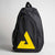 Gray background, image of a JOOLA Sling Bag, with a black and yellow JOOLA Trinity logo.