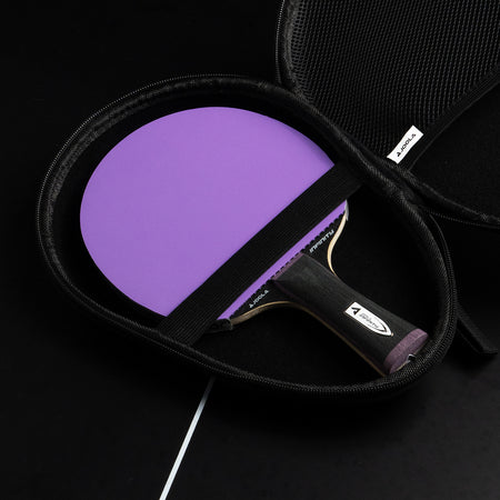 Purple JOOLA TT racket sitting in a TT case.