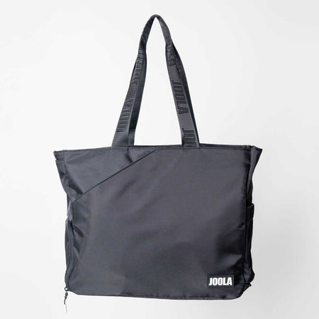 Gray background, image of a JOOLA Tote Bag, Black with JOOLA branded logo on the front and arm strap.