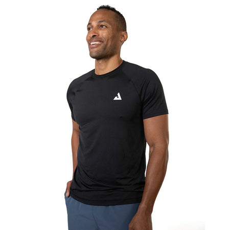 Man wearing a black athletic JOOLA Short Sleeve shirt with a logo on a white background