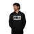Person wearing a black hoodie with 'JOOLA' logo on a white background