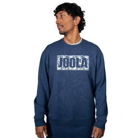 Man wearing a blue JOOLA fleece sweatshirt.