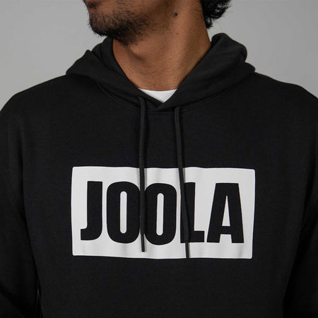 Black hoodie with 'JOOLA' logo on a gray background.