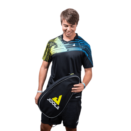 White Background Image: Ben Johns holding the Vision Duo Pickleball Paddle case.