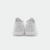 White background, product image showing the back of a pair of JOOLA TT SM4SH table tennis shoes, white and gray.