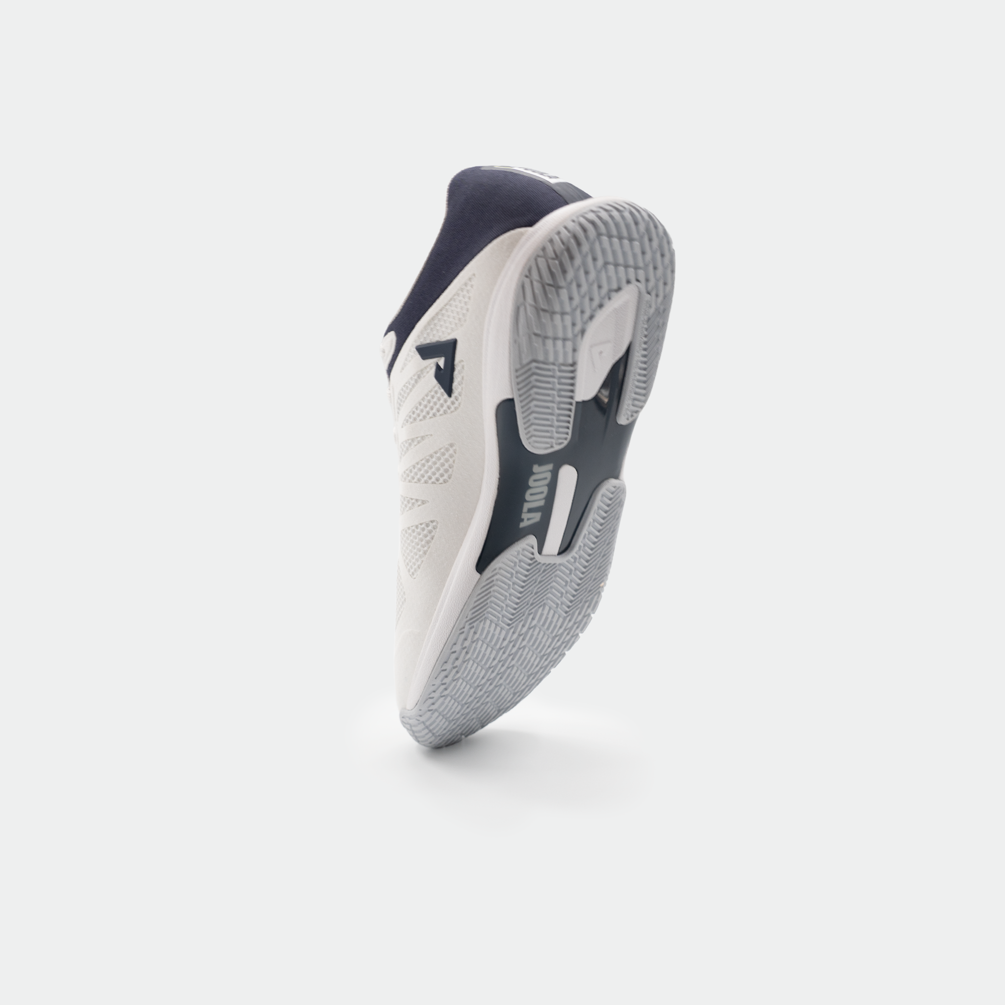 White background, image of a JOOLA TT SM4SH table tennis shoe, shoe is white and navy blue.