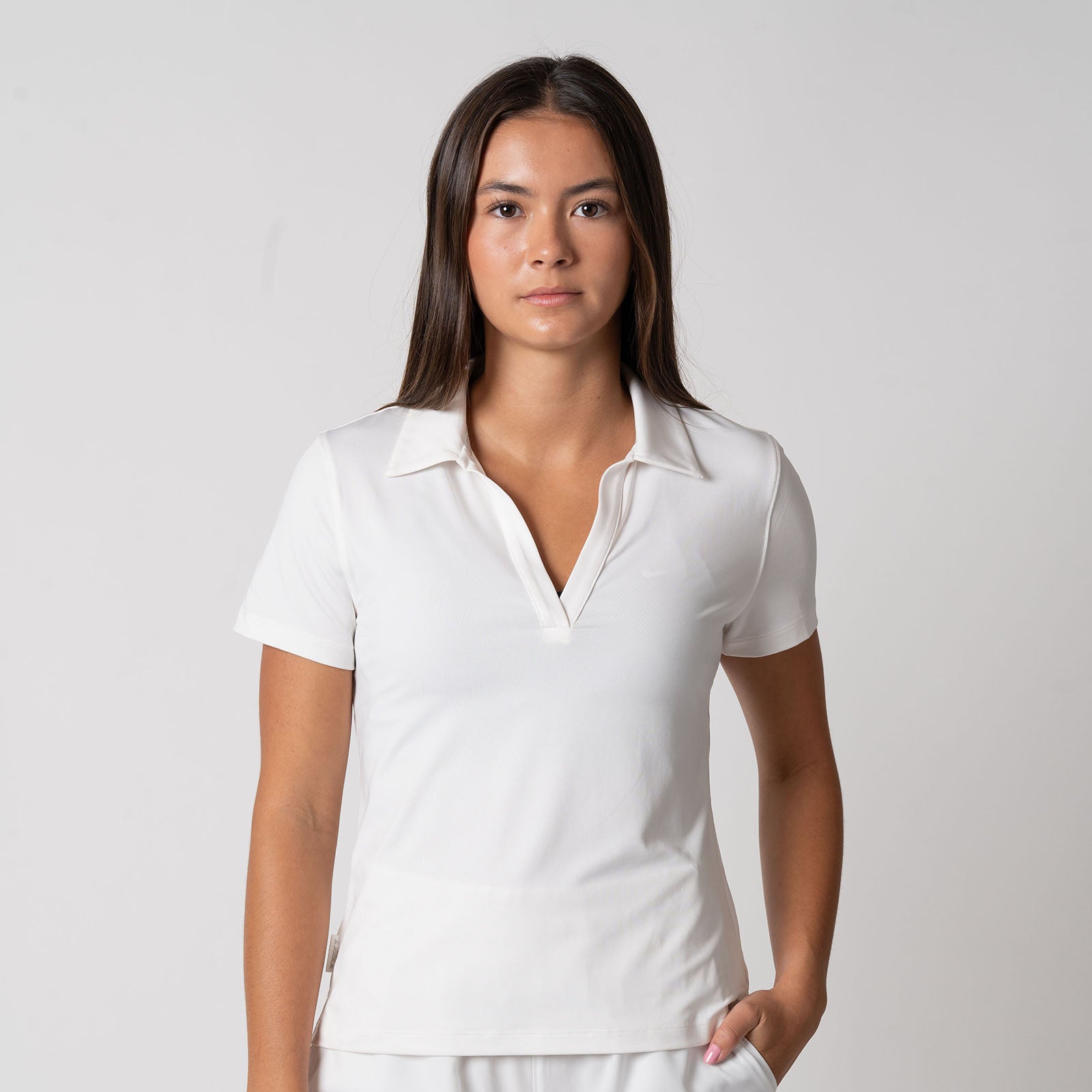 Image showing a female model wearing a JOOLA women's club polo, white.