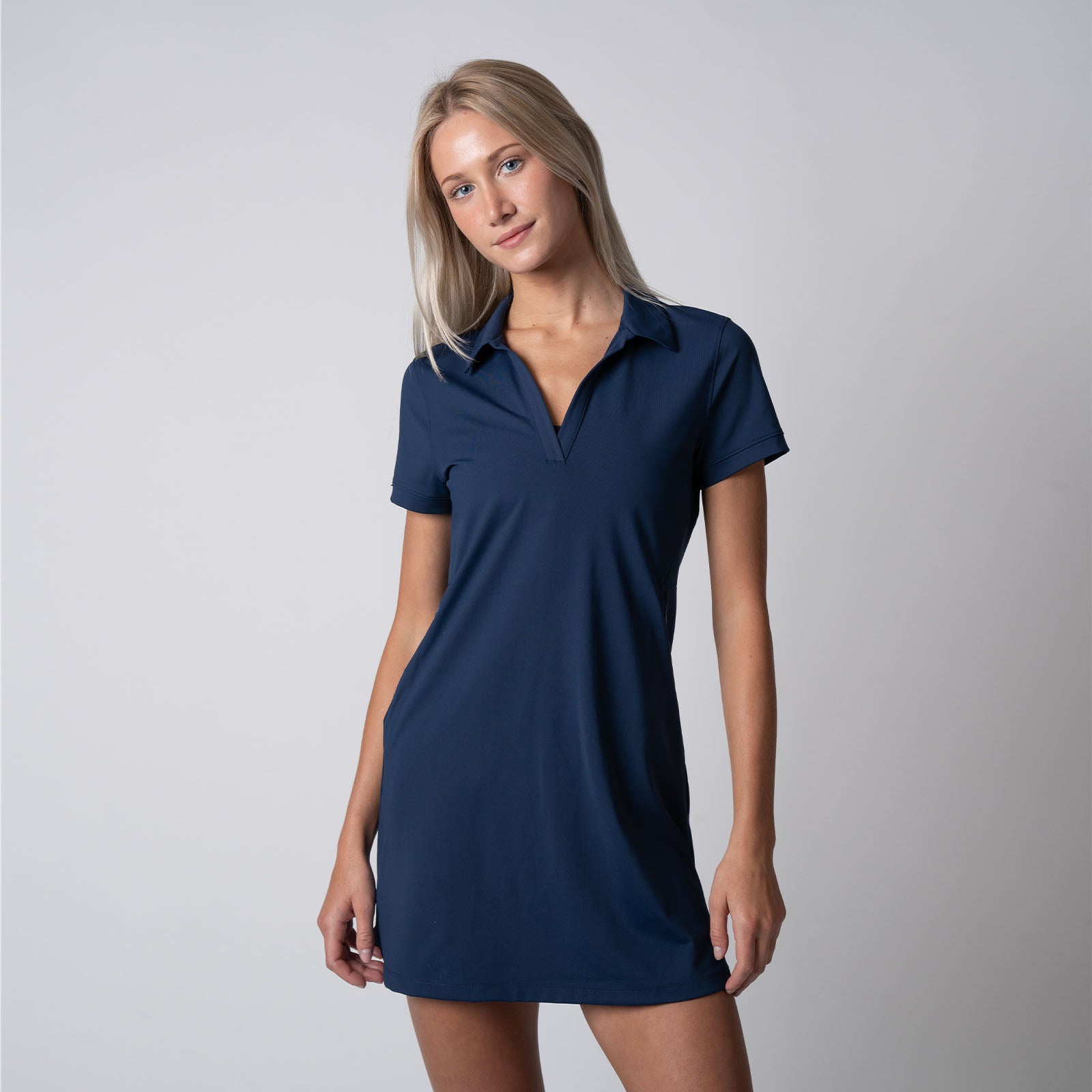 Image showing a female model wearing a JOOLA Women's Club Polo Dress, Navy.