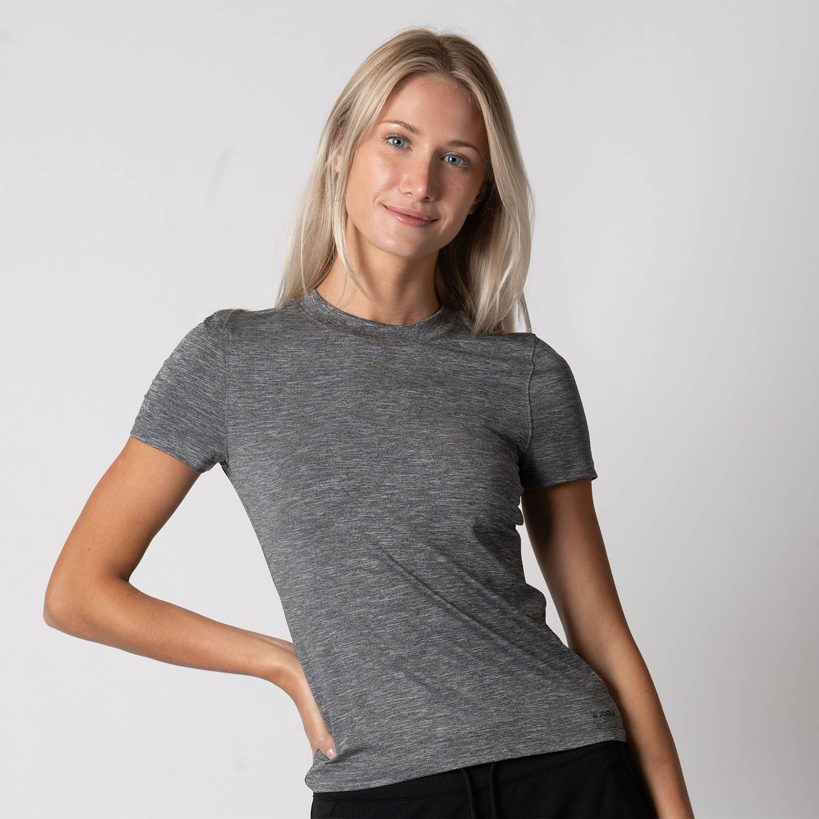 Image of a female model wearing a JOOLA Women's Club Short Sleeve Shirt, Charcoal Heather.