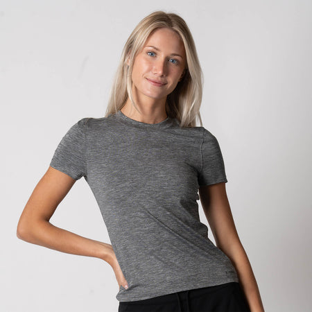 Image of a female model wearing a JOOLA Women's Club Short Sleeve Shirt, Charcoal Heather.