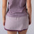 Image showing the back of a JOOLA women's club skort, dusty mauve.