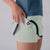 Product image showing the hidden pocket of the JOOLA Women's Club Skort. Hushed Mint.