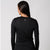 Full shot image of the back of a JOOLA female model wearing a JOOLA Women's Court Long Sleeve, Black.