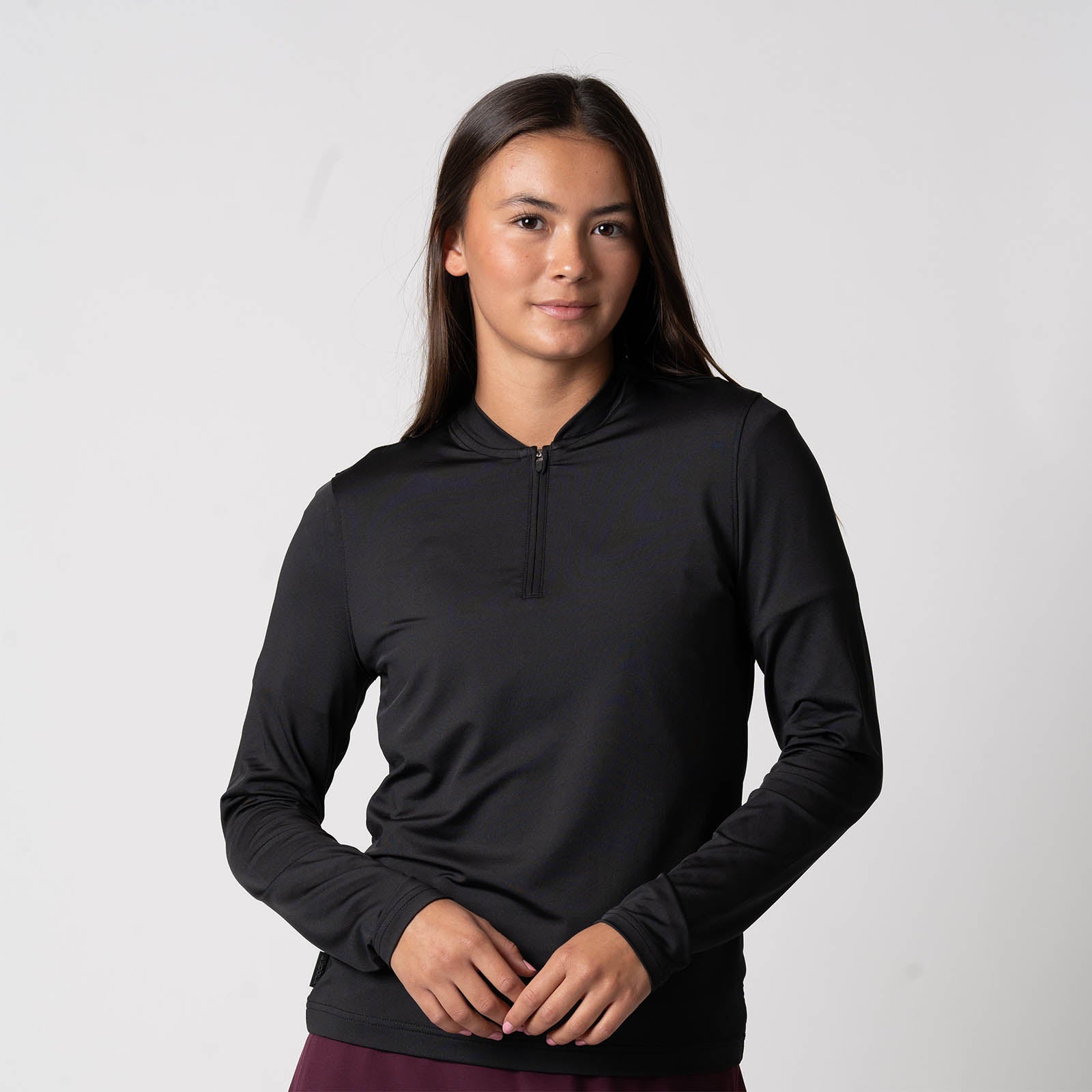 Image of a female model wearing a the JOOLA Women's Quarter Zip Pullover, Black.