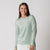 Image of a female model wearing a JOOLA Women's Quarter Zip Pullover, Hushed Mint.